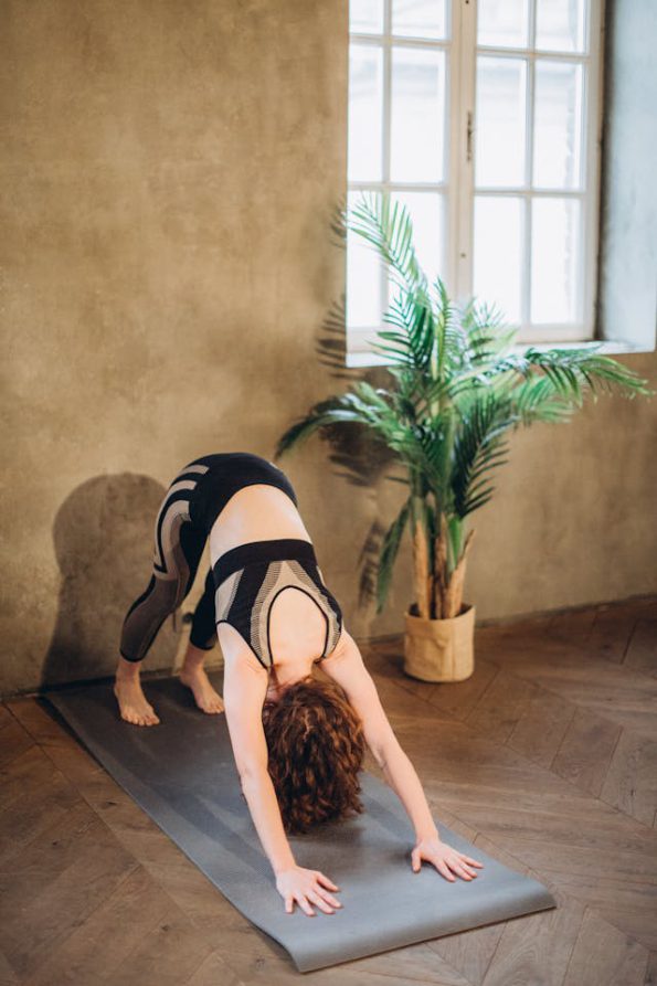 Downward-Facing Dog for a full-body stretch and improved circulation.
